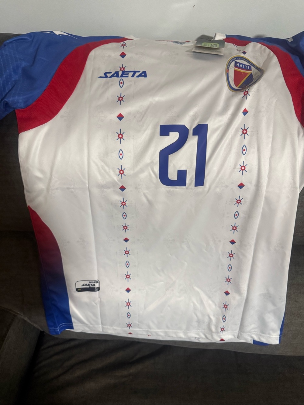 Haiti Men’s White Soccer Jersey with Blue & Red Accents - No. 21
